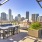 Large rooftop patio with a city view