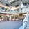 Large fitness center with cardio and weight lifting equipment.