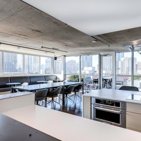 Community Kitchen  Spacious and well lit community kitchen with large community table
