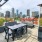 dining area on rooftop terrace with city views
